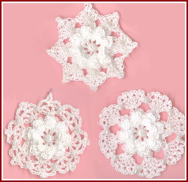 Three rose snowflakes with pearl trim.